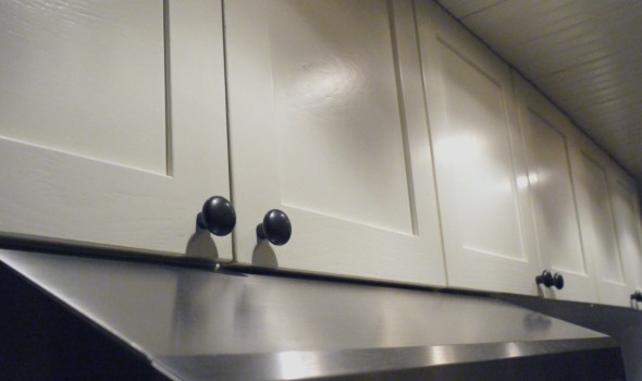 Paint kitchen cabinets yourself.