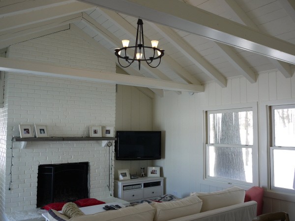 Painted Paneling - after image 1 Painted interior wood paneling, ceiling, beams and fireplace complete.